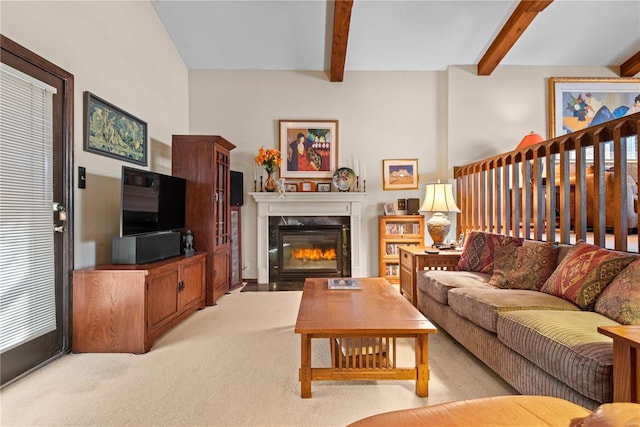 carpeted living room with beamed ceiling and a premium fireplace