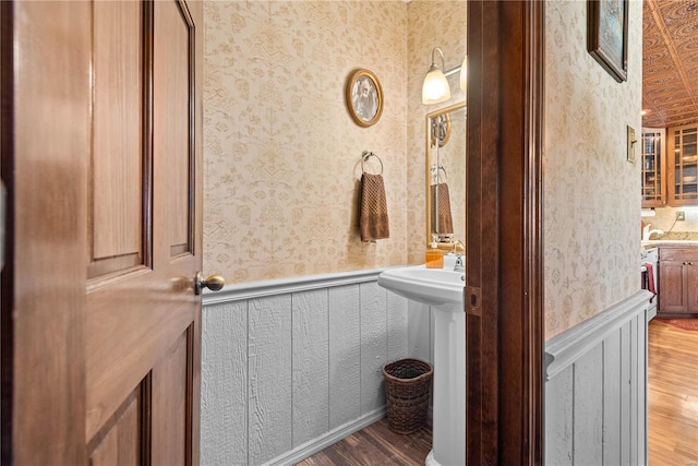 bathroom featuring wood-type flooring