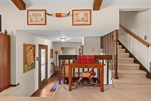 dining room featuring beam ceiling and french doors