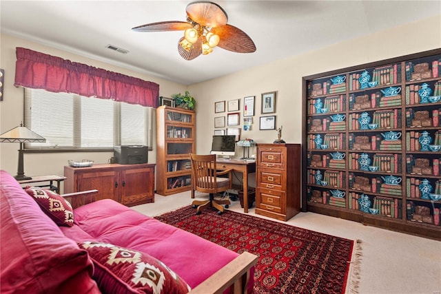 office with ceiling fan and light colored carpet