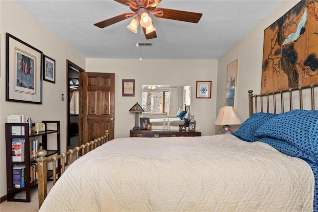 bedroom featuring ceiling fan and carpet floors