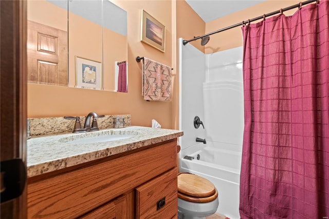 full bathroom featuring toilet, shower / bath combo, and vanity