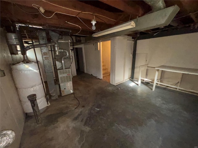 basement featuring water heater