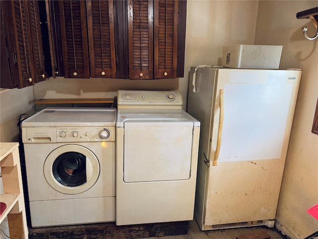 clothes washing area with independent washer and dryer