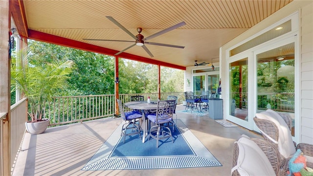 exterior space featuring ceiling fan