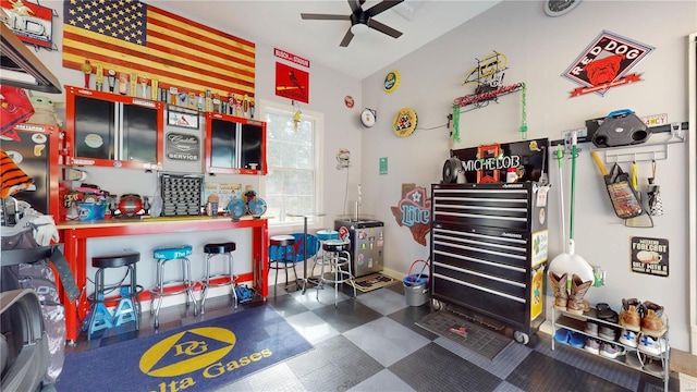 interior space with ceiling fan