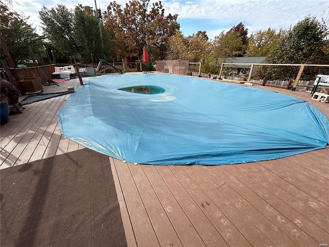 view of pool featuring a deck