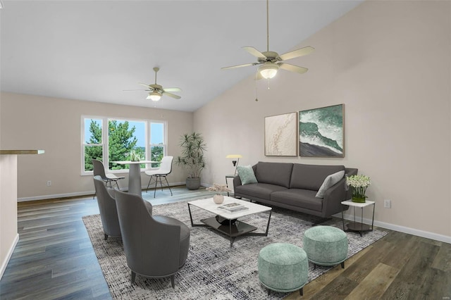 living room with vaulted ceiling, ceiling fan, and dark hardwood / wood-style floors