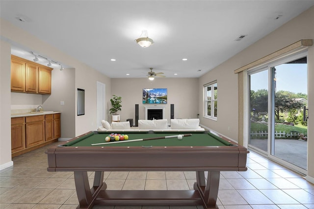 recreation room featuring ceiling fan, light tile patterned flooring, track lighting, and billiards