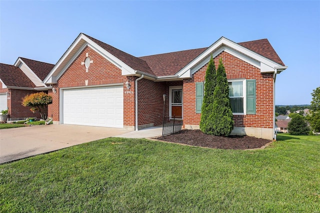 single story home featuring a garage and a front lawn