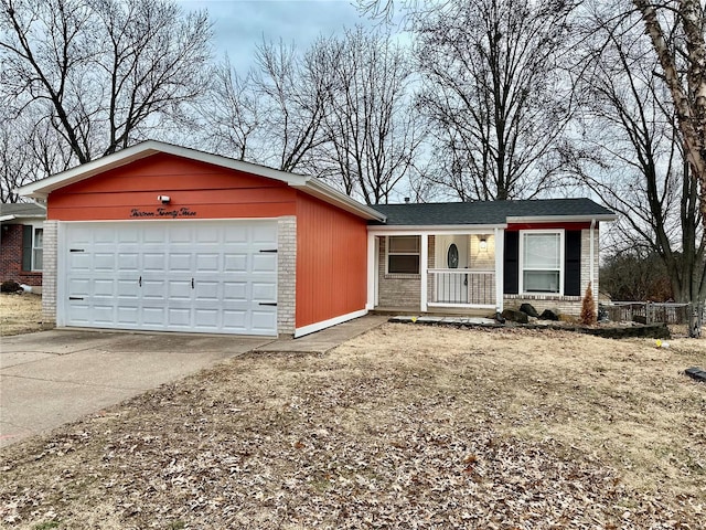 single story home featuring a garage and covered porch