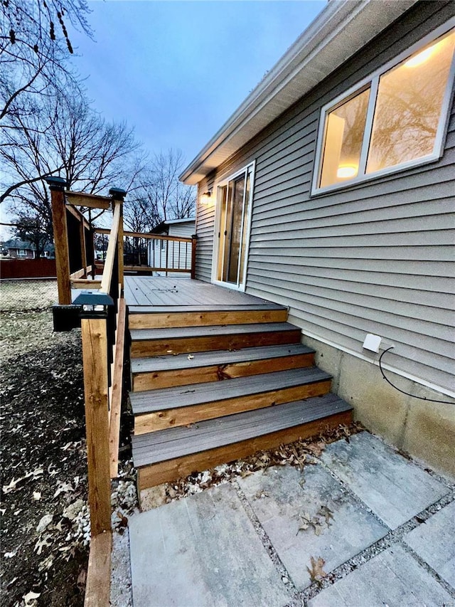 entrance to property featuring a deck