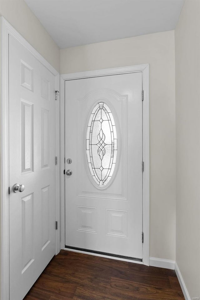 entrance foyer featuring dark hardwood / wood-style flooring