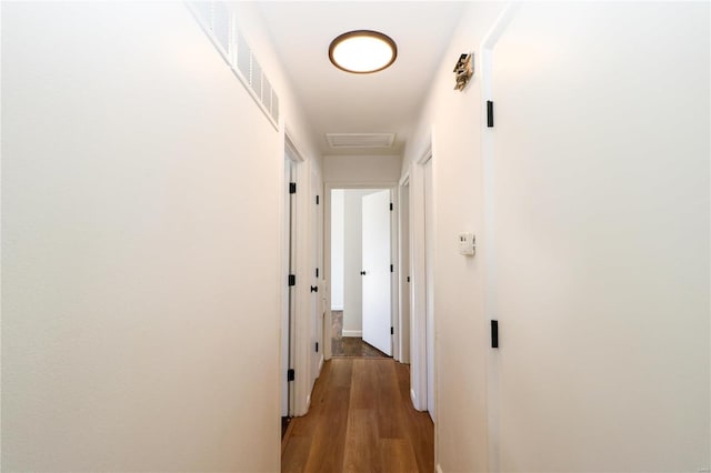 hallway with light wood-type flooring