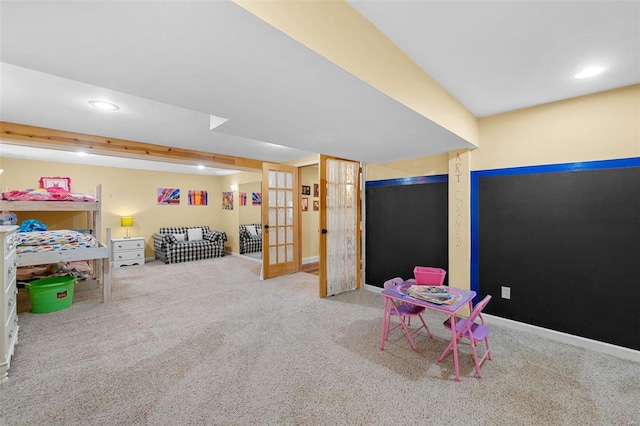 game room with light colored carpet