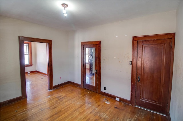 foyer entrance with light hardwood / wood-style flooring