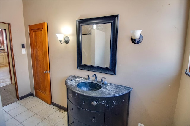 bathroom featuring tile patterned floors and vanity