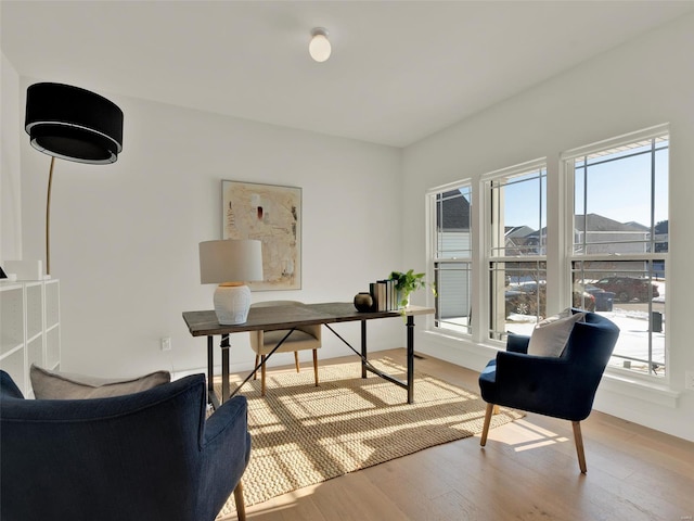 office area with light wood-style floors