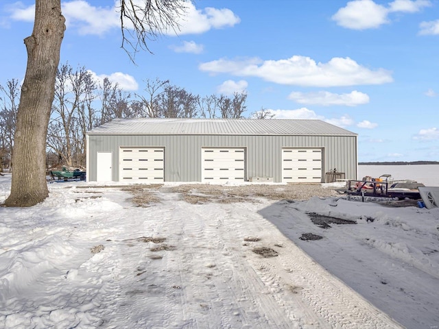 view of snow covered garage