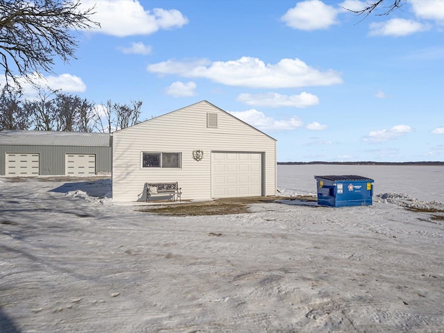 garage featuring a water view