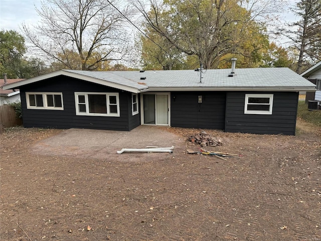 back of property featuring a patio area and central air condition unit