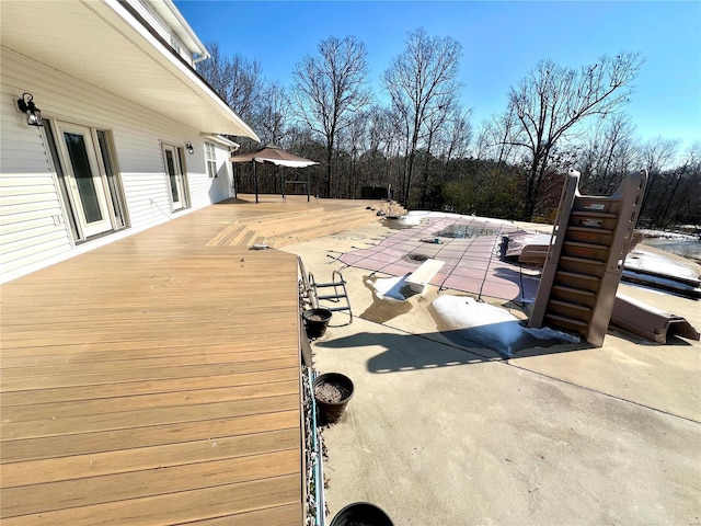 wooden deck featuring a patio