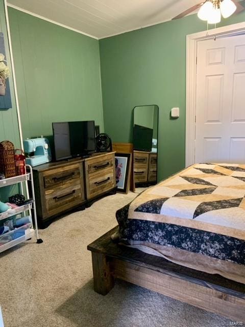 carpeted bedroom with a ceiling fan