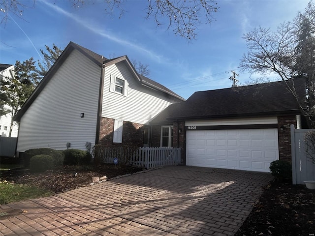 view of property exterior featuring a garage