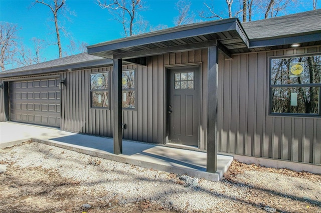 entrance to property featuring a garage