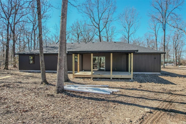 rear view of property with a deck