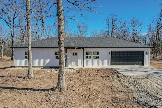 single story home featuring a garage