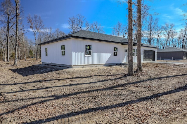 view of home's exterior featuring a garage