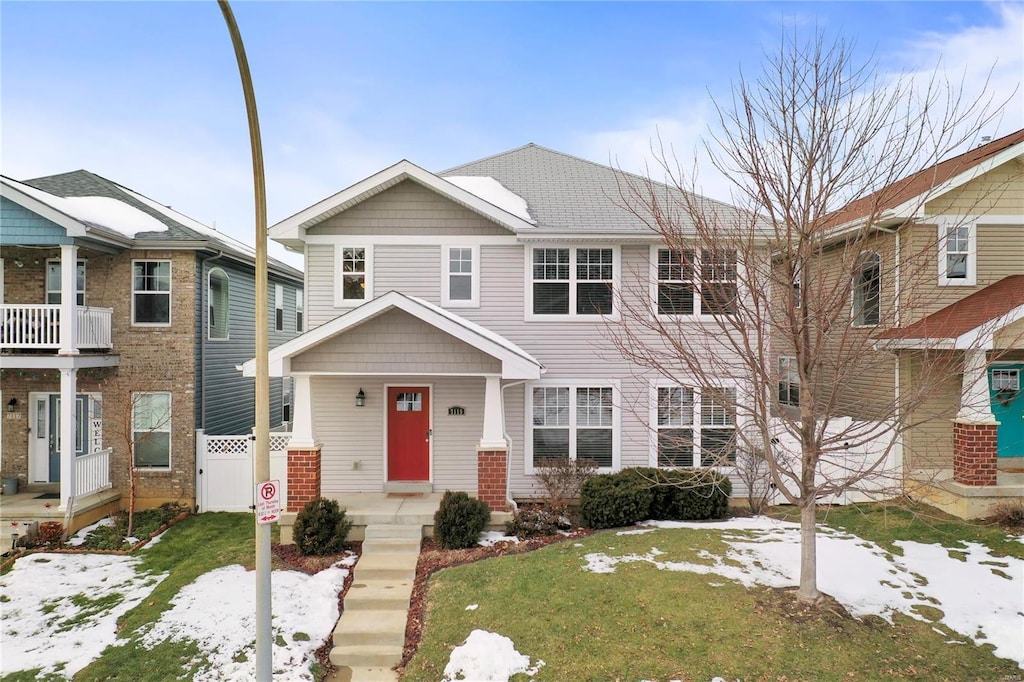 view of front of home with a yard