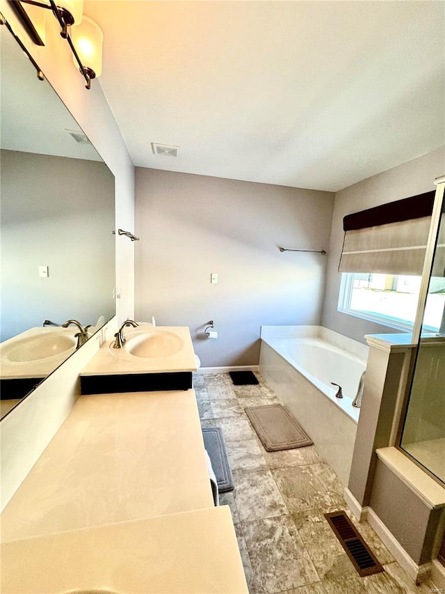 bathroom with vanity and plus walk in shower