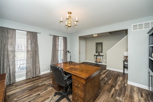 office with an inviting chandelier and dark hardwood / wood-style floors