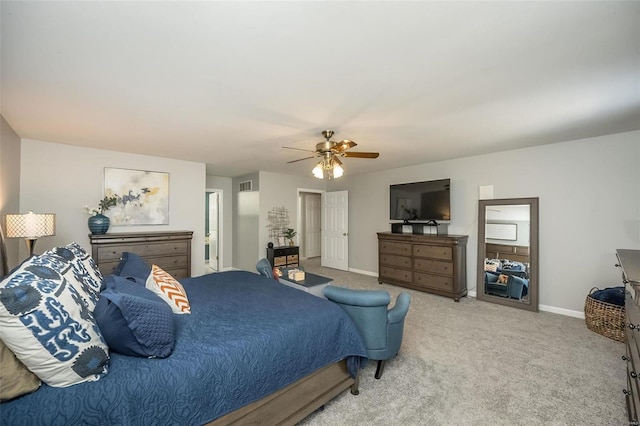 bedroom with light carpet and ceiling fan