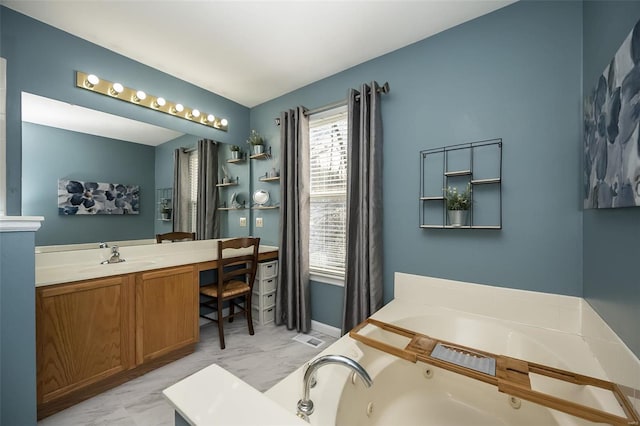 bathroom featuring vanity and a bathing tub