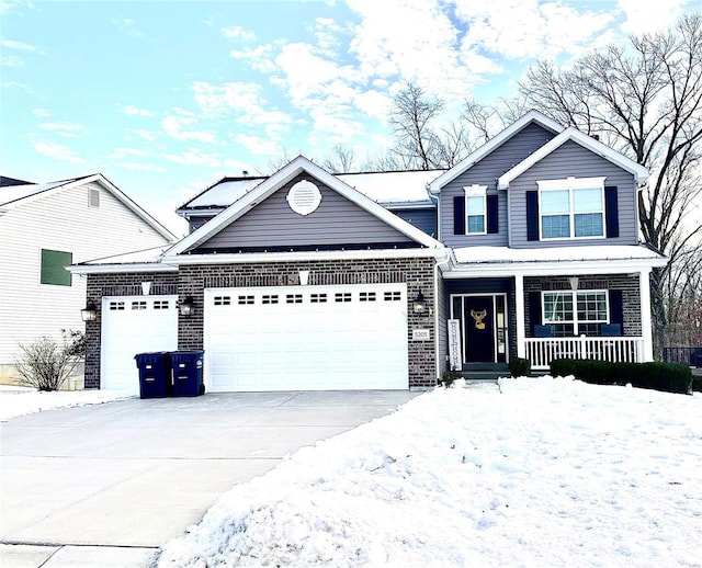 view of front facade featuring a garage and a porch