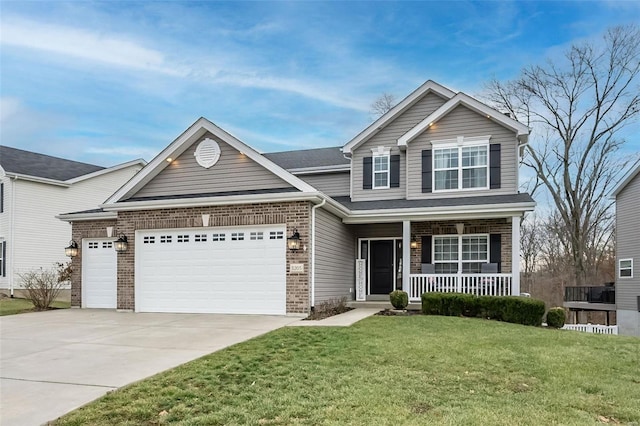 view of front of home with a porch, a garage, and a front yard