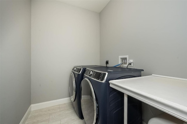 laundry room with independent washer and dryer