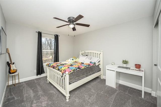 bedroom featuring dark carpet and ceiling fan