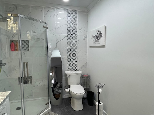 bathroom featuring a shower with door, toilet, vanity, and crown molding