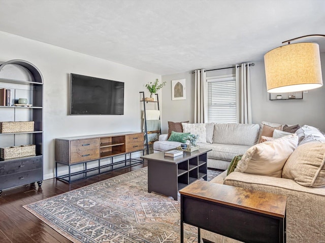 living room featuring dark hardwood / wood-style floors