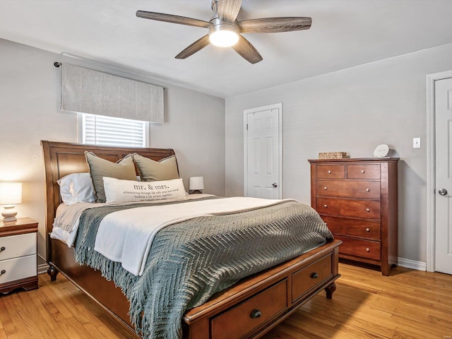 bedroom featuring ceiling fan and light hardwood / wood-style flooring