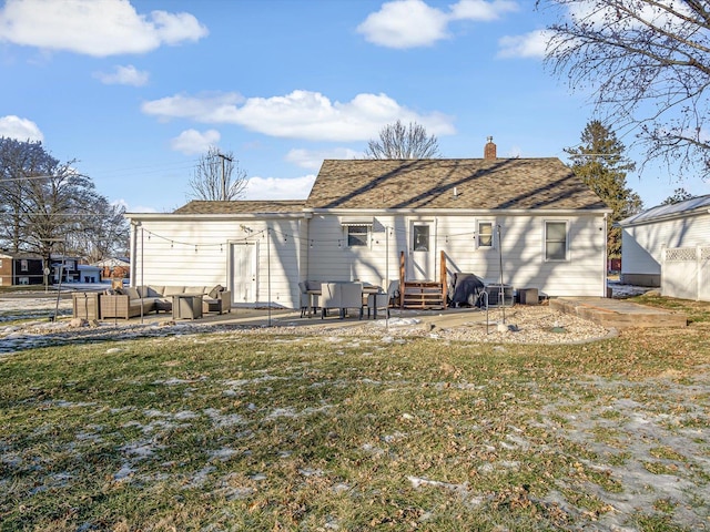 rear view of house featuring a yard, an outdoor hangout area, and a patio