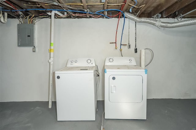 laundry area featuring washer and clothes dryer and electric panel