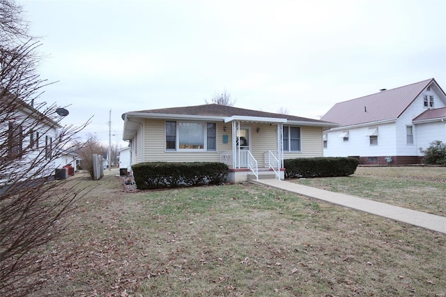 view of front of home with a front lawn