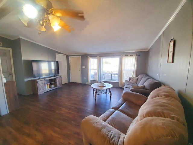 living room featuring ceiling fan, vaulted ceiling, dark hardwood / wood-style floors, and ornamental molding