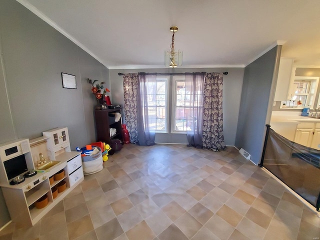 dining room with crown molding