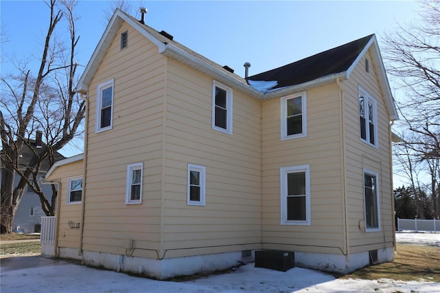 view of snow covered property